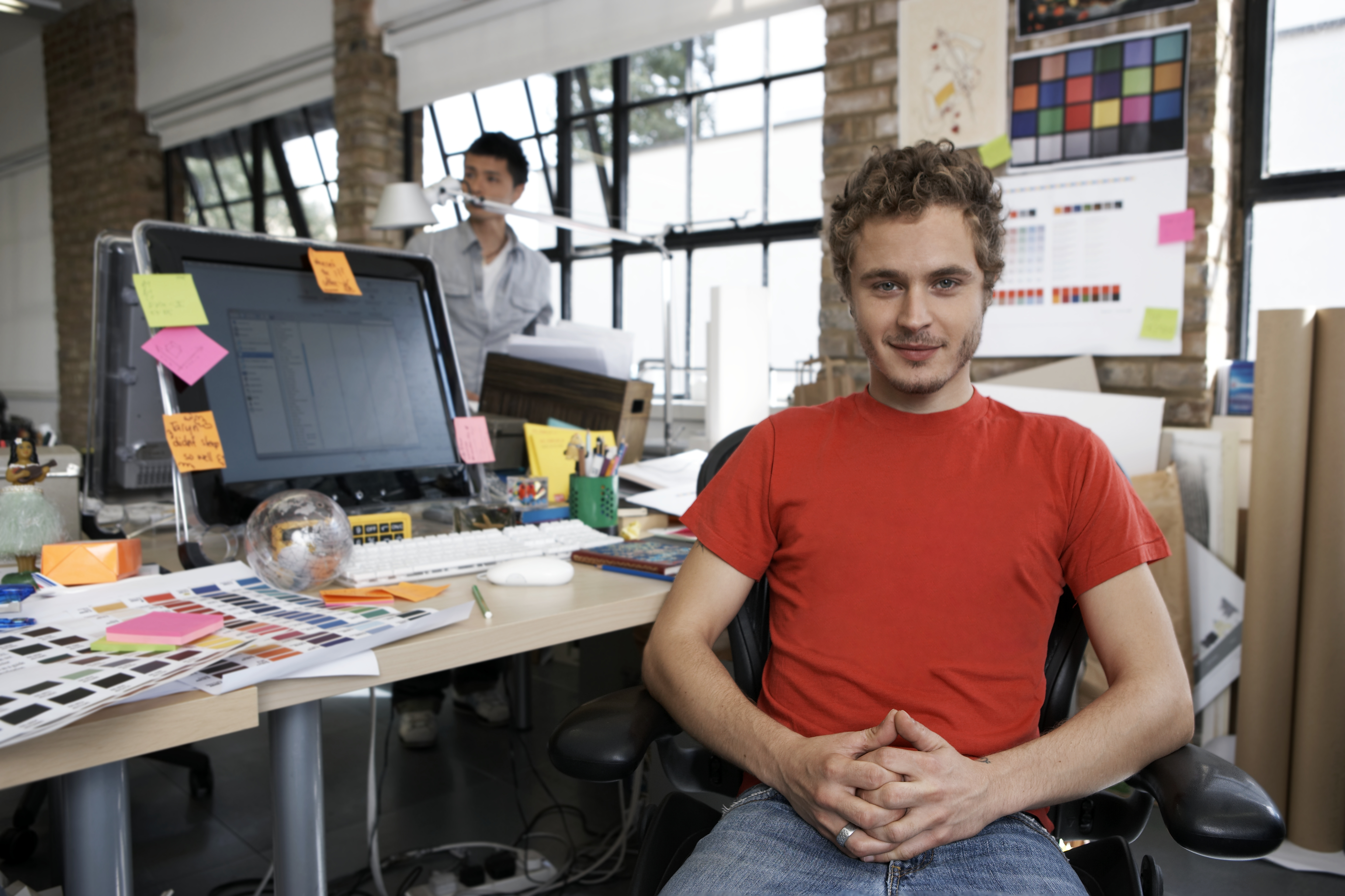 man at desk with computer83286964