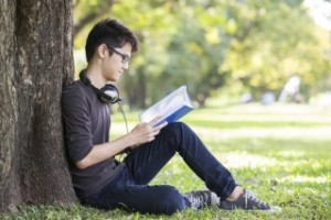 reading under tree